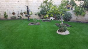 how to clean artificial grass