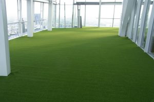 how to lay artificial grass on soil